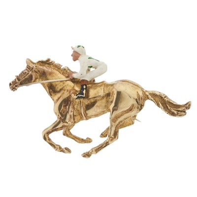 Lot 167 - A 9ct gold polychrome enamel horse and jockey brooch