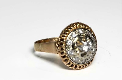 Lot 242 - An 18ct gold white sapphire cluster dress ring