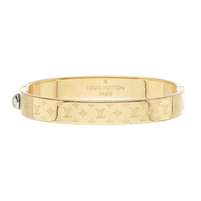 Lot 455 - Louis Vuitton, a gold-tone Nanogram bracelet.