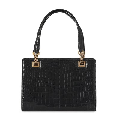 Lot 358 - Gucci, a vintage crocodile handbag.