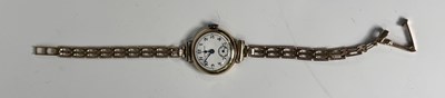 Lot 239 - A Zenith 9ct gold manual wind bracelet watch,...