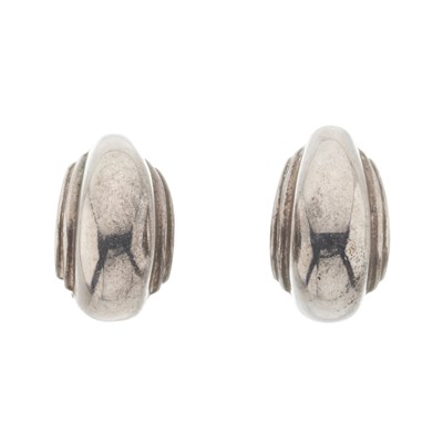 Lot 495 - Tiffany & Co. x Paloma Picasso, a pair of silver hoop earrings.
