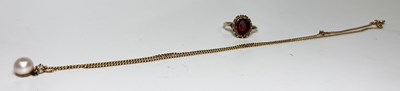 Lot 250 - A 9ct gold garnet ring and a 9ct gold pearl necklace