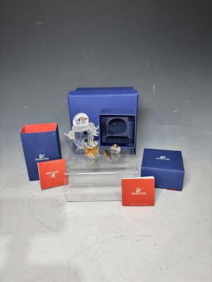Lot 290 - A boxed Swarovski snowman together with a...