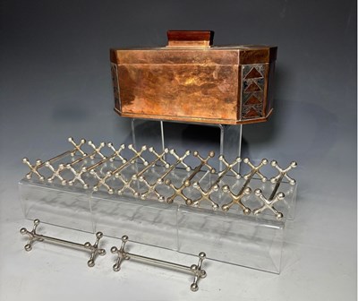 Lot 164 - An art deco copper teacaddy, inlaid geomatric...