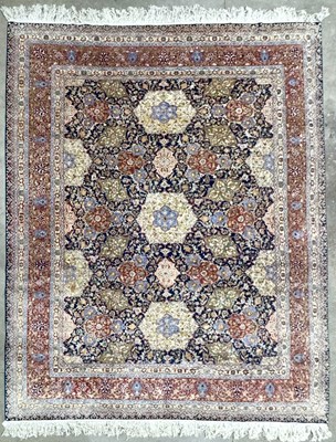 Lot 344 - A large hand-knotted silk Persian blend...