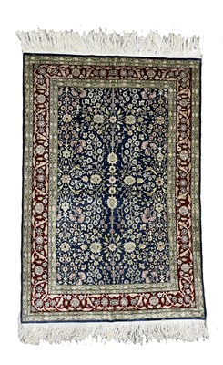 Lot 333 - A Hereke type silk rug, central panel of a...