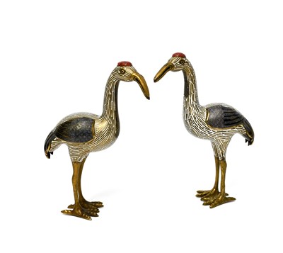 Lot 483 - A pair of Chinese cloisonne enamel cranes,...