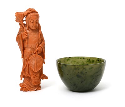 Lot 465 - A Chinese coral carving of a female attendant,...