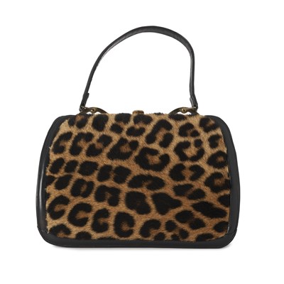 Lot 516 - A vintage 1960s leopard handbag w/ matching purse.