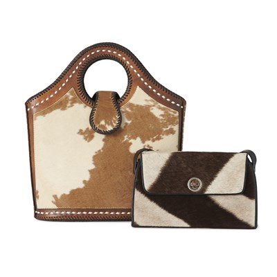 Lot 517 - Two fur handbags.