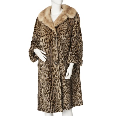 Lot 552 - An ocelot and mink fur coat.