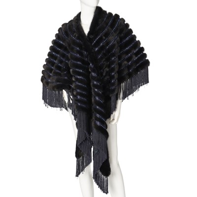 Lot 564 - Grosvenor Harrods, an embellished mink shawl.