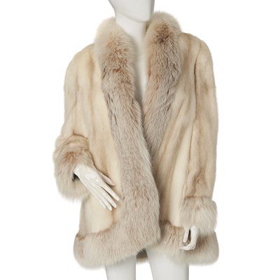 Lot 555 - Sefton Marks, a palomino mink and fox fur coat.
