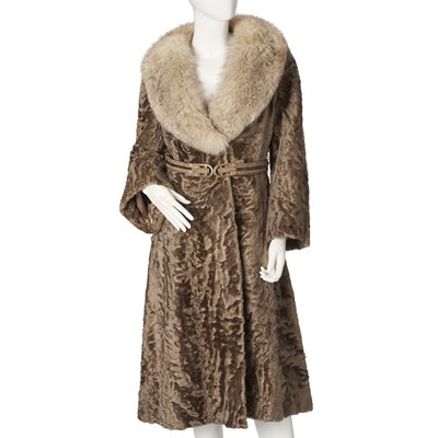 Lot 558 - Grosvenor Harrods, a beige Astrakhan and fox fur coat.