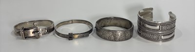 Lot 217 - Four silver bangle bracelets