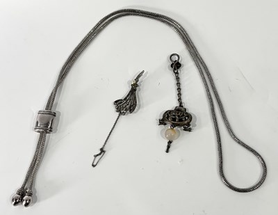 Lot 245 - A silver lariat necklace, a pendant and a marcasite brooch