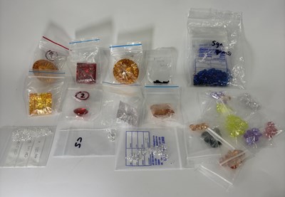Lot 277 - A selection of synthetic gemstones, cubic zirconia's, paste etc.