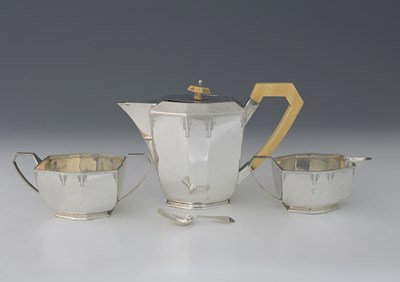 Lot 275 - A George V Art Deco silver three-piece coffee...