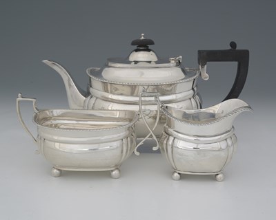 Lot 277 - A George V silver three-piece tea set, F T Ray...
