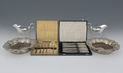 Lot 369A - A group of plated wares, to include a pair of...
