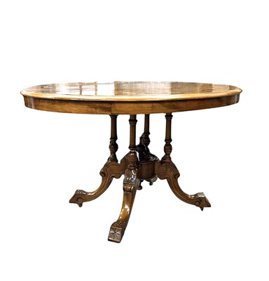 Lot 358 - A Victorian oval tilt-top centre table, the...