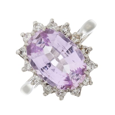 Lot 149 - An 18ct gold pink topaz and diamond cluster ring