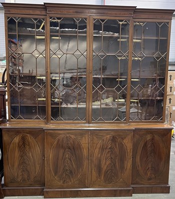 Lot 398 - A large Georgian style mahogany breakfront...