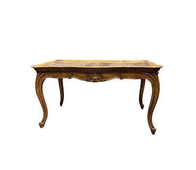 Lot 373 - A walnut coffee table, on cabriole legs,...