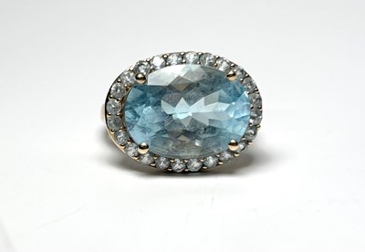 Lot 257 - A 9ct gold blue topaz cluster ring