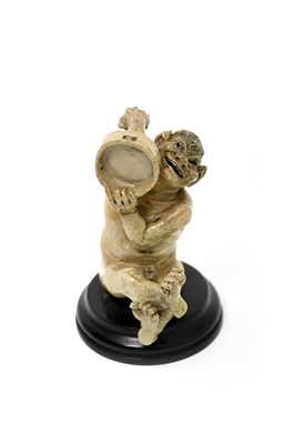 Lot 29 - A Martin Brothers stoneware Imp Musician...