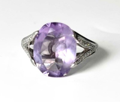 Lot 251 - An 18ct gold amethyst and diamond dress ring