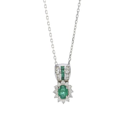 Lot 85 - A 14ct gold emerald and diamond cluster pendant, with 18ct gold chain