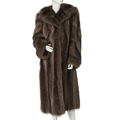 Lot 545 - A full-length raccoon fur coat.