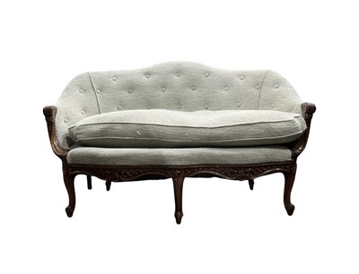 Lot 376 - A walnut framed two seater salon sofa, carved...