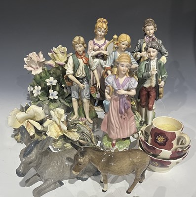 Lot 21 - A collection of Capodimonte figures and bouqet...