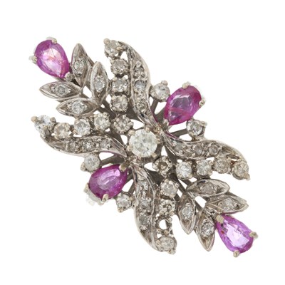 Lot 111 - An early to mid 20th century diamond and ruby dress ring