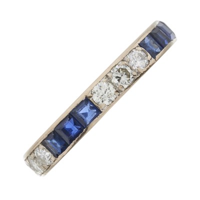 Lot 166 - A mid 20th century sapphire and diamond full eternity ring