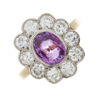 Lot 44 - An 18ct gold pink sapphire and diamond cluster ring