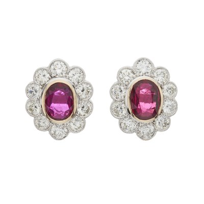Lot 99 - A pair of 18ct gold ruby and diamond cluster stud earrings