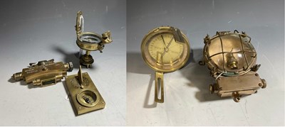 Lot 424 - A brass bulkhead engine light and an Elliot...