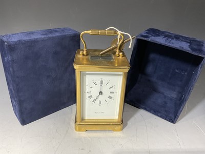 Lot 180 - A Mappin & Webb carriage clock, boxed with key