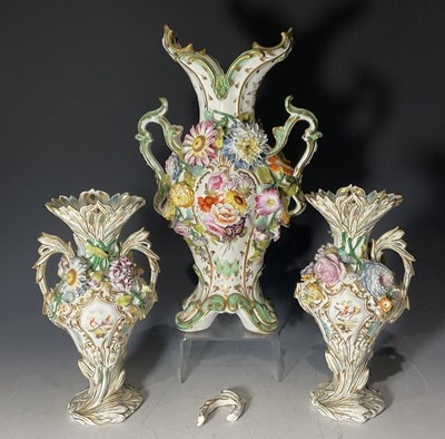 Lot 94 - A trio of Rockingham or Coalport-type floral...