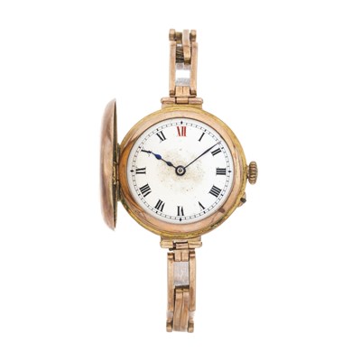Lot 246 - A 9ct gold half hunter bracelet watch