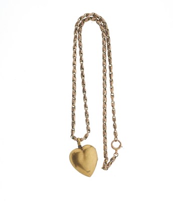 Lot 5 - A late Victorian 15ct gold ruby and diamond heart locket pendant, with chain