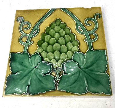 Lot 69 - An Art Nouveau relief moulded and tubelined...