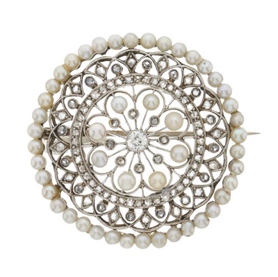 Lot 13 - An Edwardian white metal diamond and pearl brooch