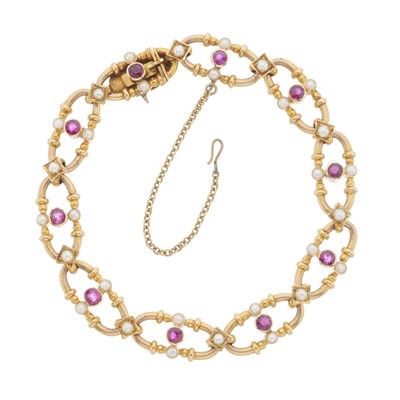 Lot 116 - An early 20th century 15ct gold ruby and pearl bracelet