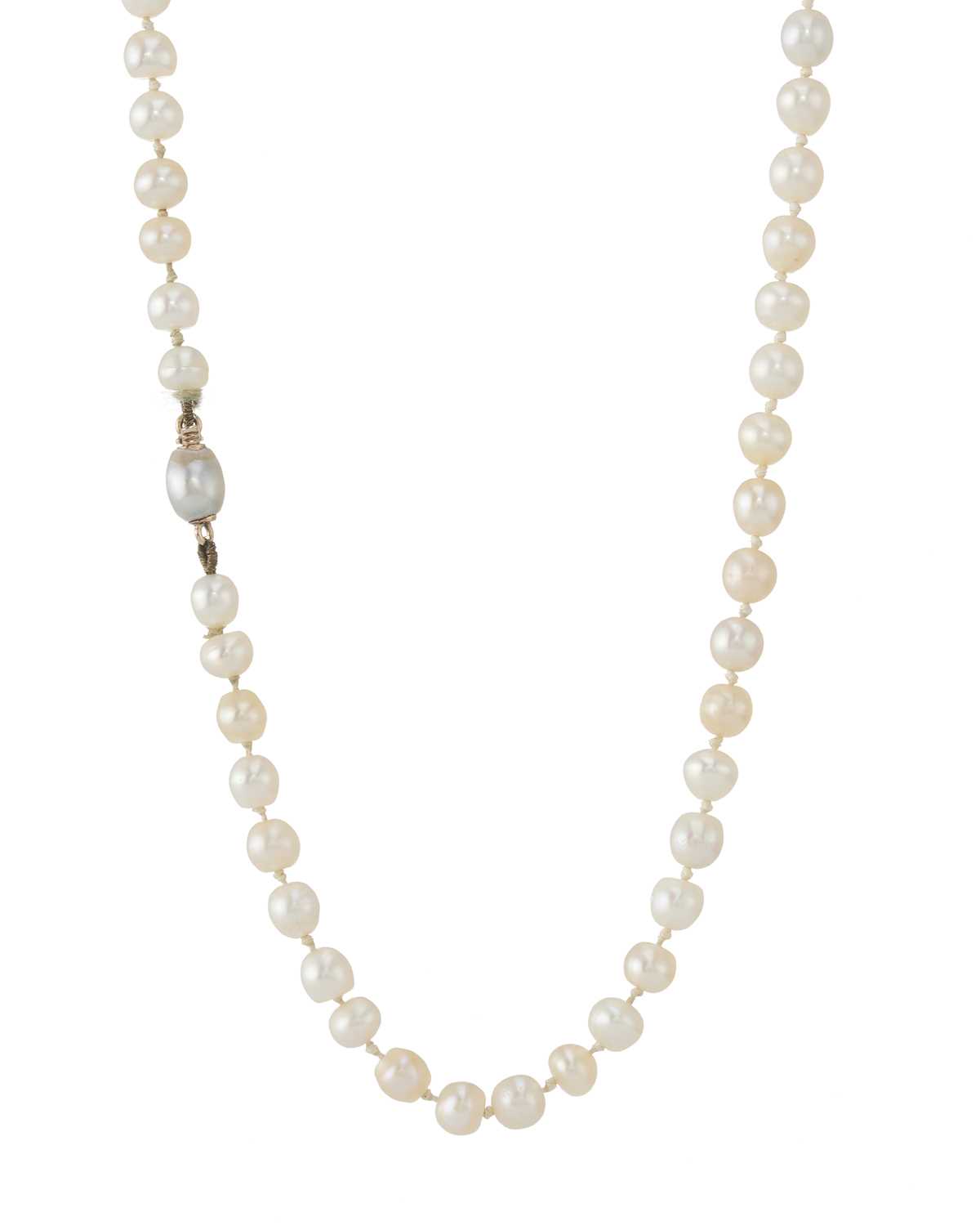 Lot 6 - An early 20th century natural pearl single-strand necklace, with grey pearl clasp