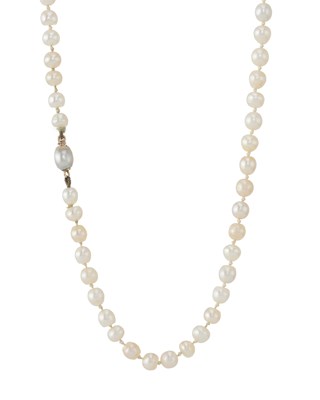 Lot 6 - An early 20th century natural pearl single-strand necklace, with grey pearl clasp